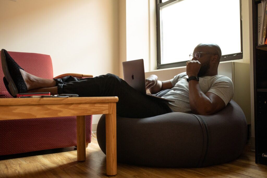 Man working from home to reduce carbon emissions